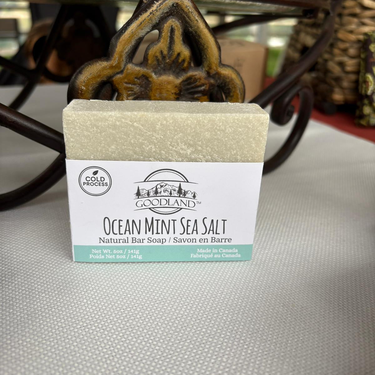 Goodland Ocean Mint Sea Salt Soap Bar with decorative background