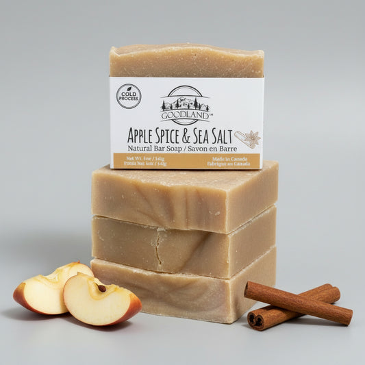 Goodland bars of soap stacked with apples and cinnamon on neutral background